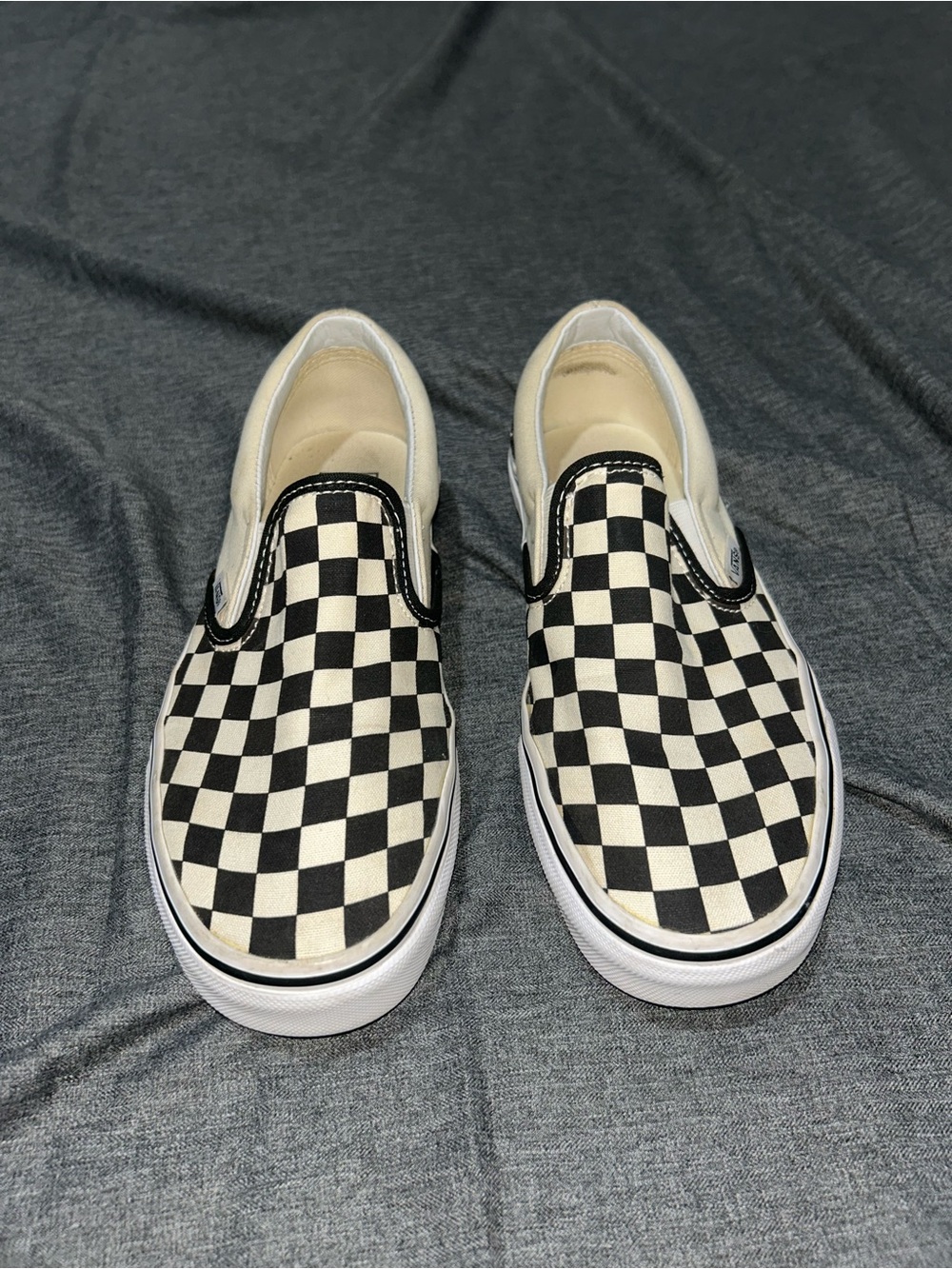 Vans Checkerboard Slip-On Sneakers in Black and White